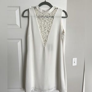 White high neck, deep V dress